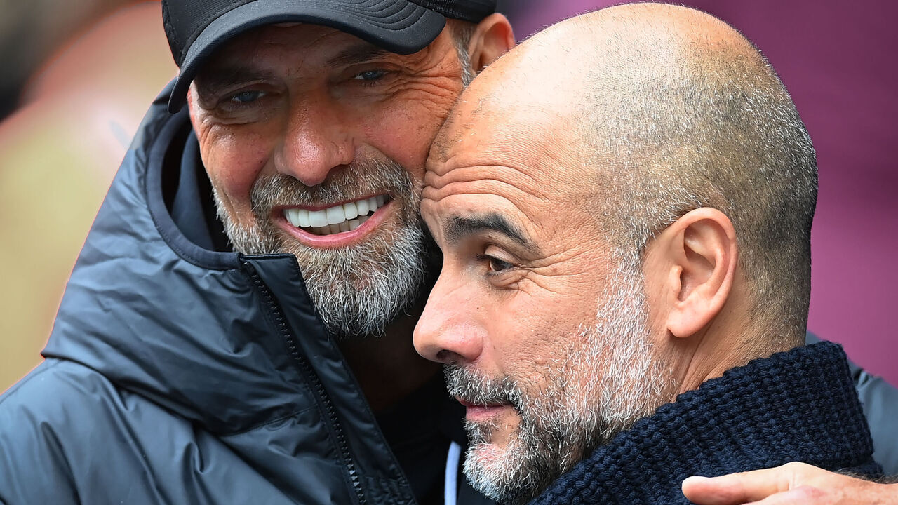 MANCHESTER, ENGLAND - APRIL 01: Liverpool manager Jurgen Klopp greets Manchester City manager Pep Guardiola before the Premier League match between Manchester City and Liverpool FC at Etihad Stadium on April 01, 2023 in Manchester, England.