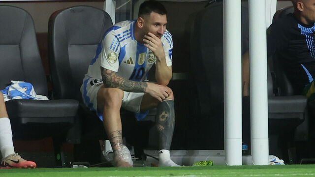 MIAMI GARDENS, FL - JULY 14: Argentina forward Lionel Messi (10)sits on the bench with ice on his foot in the second half during the Copa America Finals match between Colombia and Argentina on Sunday, July 14 2024 at Hard Rock Stadium in Miami Gardens, Fla.