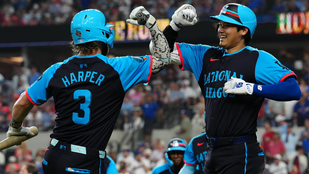 ARLINGTON, TX - JULY 16: Shohei Ohtani #17 of the Los Angeles Dodgers celebrates with Bryce Harper #3 of the Philadelphia Phillies after hitting a three RBI home run in the third inning during the 94th MLB All-Star Game presented by Mastercard at Globe Life Field on Tuesday, July 16, 2024 in Arlington, Texas.