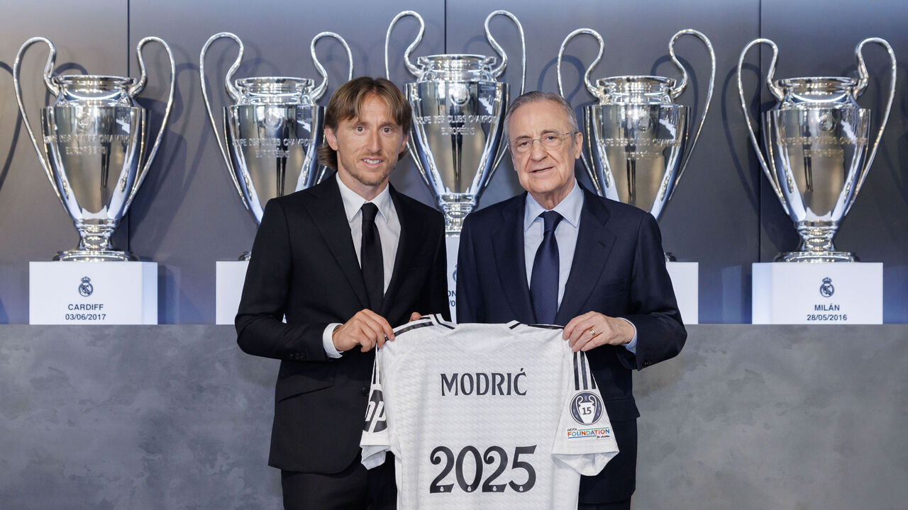 MADRID, SPAIN - JULY 17: Luka Modrić, player of Real Madrid, and Florentino Pérez pose as they celebrate his contract extension at Valdebebas training ground on July 17, 2024 in Madrid, Spain.