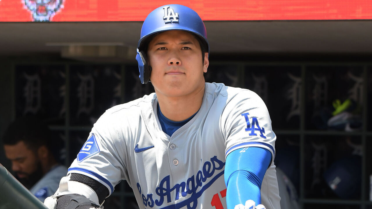 DETROIT, MI - JULY 13: Shohei Ohtani #17 of the Los Angeles Dodgers looks on from the dugout while waiting to bat just before the start of the game against the Detroit Tigers at Comerica Park on July 13, 2024 in Detroit, Michigan. Ohtani hit his 200th career MLB home run in the 5th inning. The Tigers defeated the Dodgers 11-9 in 10 innings.