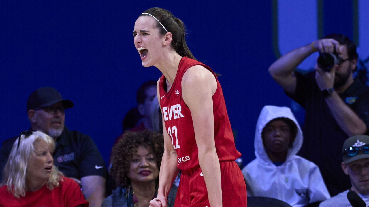 ARLINGTON, TEXAS - JULY 17: Caitlin Clark #22 of the Indiana Fever reacts after a play against the Dallas Wings at the College Park Center on July 17, 2024 in Arlington, Texas.