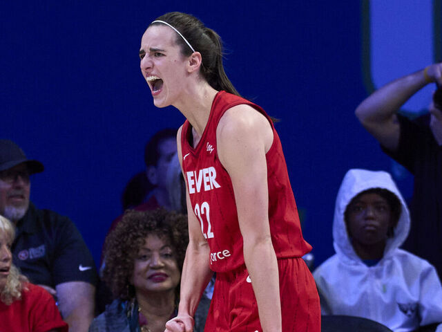 ARLINGTON, TEXAS - JULY 17: Caitlin Clark #22 of the Indiana Fever reacts after a play against the Dallas Wings at the College Park Center on July 17, 2024 in Arlington, Texas.