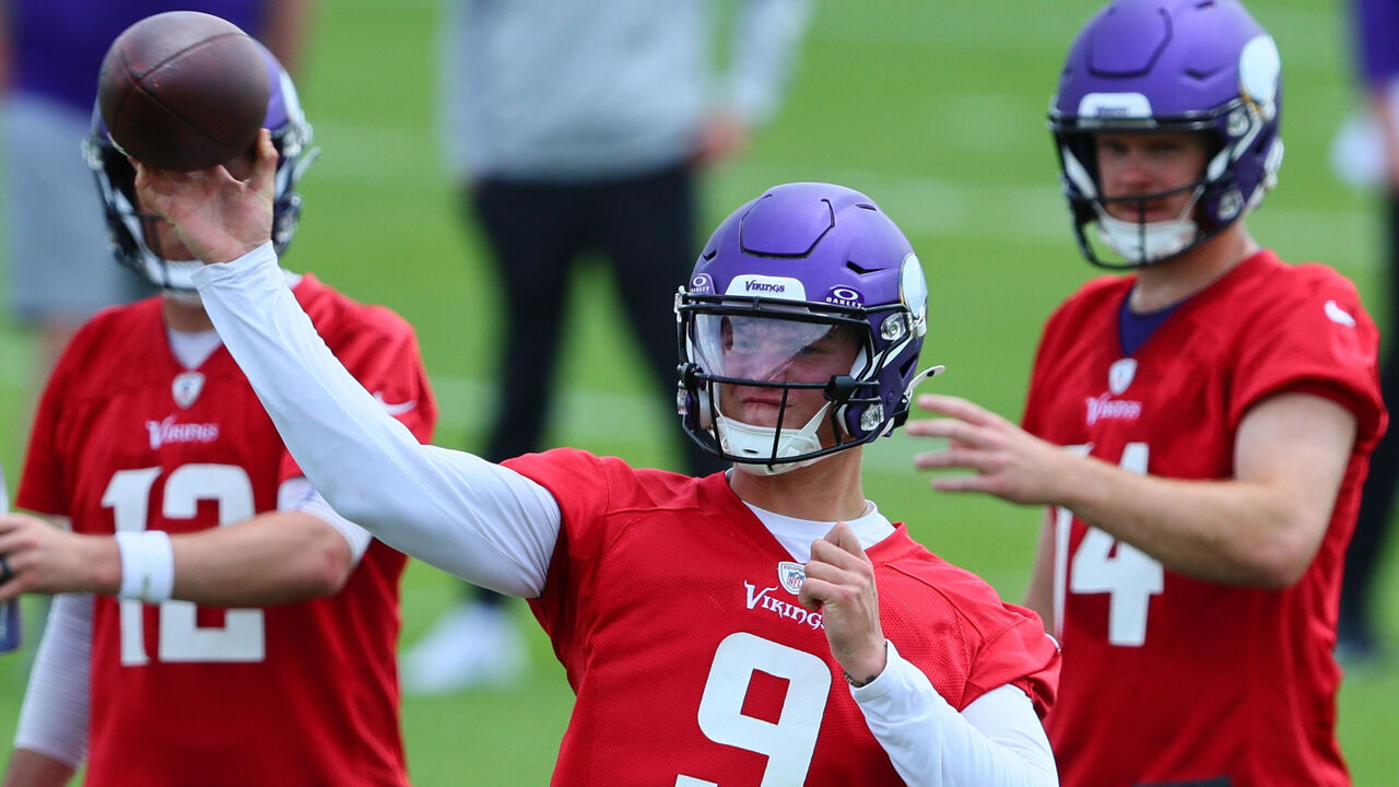 EAGAN, MINNESOTA - JUNE 04: Quarterbacks J.J. McCarthy #9, Sam Darnold #14 and Nick Mullens #12 of the Minnesota Vikings watch the drill during Minnesota Vikings mandatory minicamp at Twin Cities Orthopedics Performance Center on June 04, 2024 in Eagan, Minnesota.