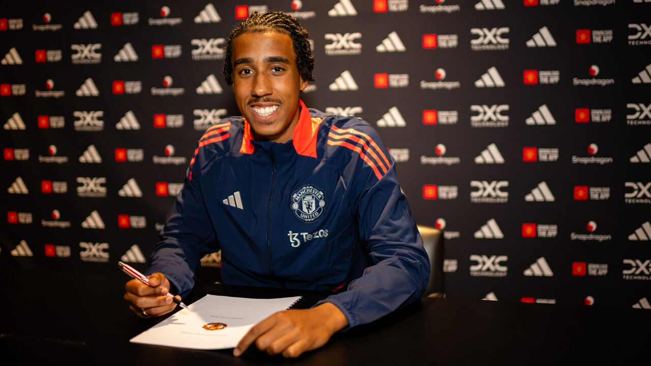 MANCHESTER, ENGLAND - JULY 18: (EXCLUSIVE COVERAGE) Leny Yoro of Manchester United poses after signing for the club at Carrington Training Ground on July 18, 2024 in Manchester, England.