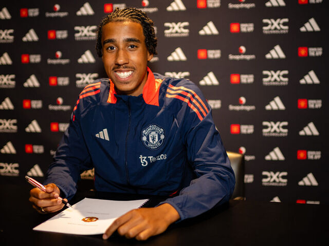 MANCHESTER, ENGLAND - JULY 18: (EXCLUSIVE COVERAGE) Leny Yoro of Manchester United poses after signing for the club at Carrington Training Ground on July 18, 2024 in Manchester, England.