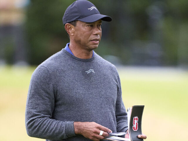 TROON, SCOTLAND - JULY 18: Tiger Woods of United States on the 11th hole on day one of The 152nd Open championship at Royal Troon on July 18, 2024 in Troon, Scotland.
