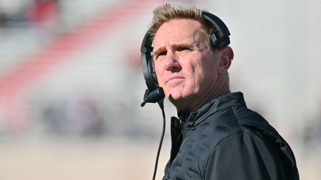 ALBUQUERQUE, NEW MEXICO - NOVEMBER 24: Head coach Blake Anderson of the Utah State Aggies looks on during the first half of their game at University Stadium on November 24, 2023 in Albuquerque, New Mexico.