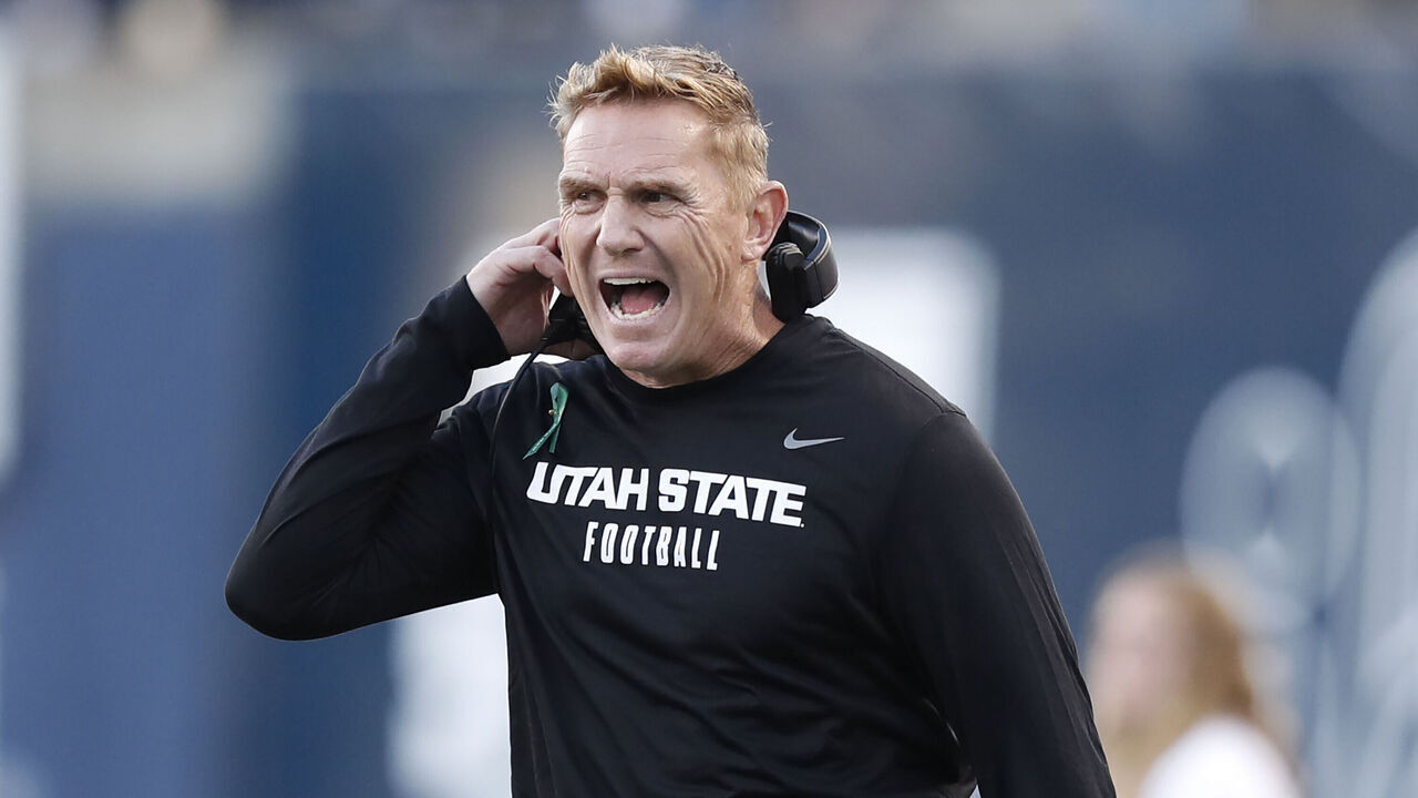 LOGAN, UT - OCTOBER 7: Head coach Blake Anderson of the Utah State Aggies yells at an official during the first half of their game against the Colorado State Rams at Maverik Stadium October 7, 2023 in Logan, Utah.