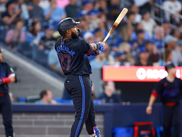 TORONTO, ON - JULY 19: Vladimir Guerrero Jr. #27 of the Toronto Blue Jays hits a two-run home run in the sixth inning during a game against the Detroit Tigers at Rogers Centre on July 19, 2024 in Toronto, Ontario, Canada.