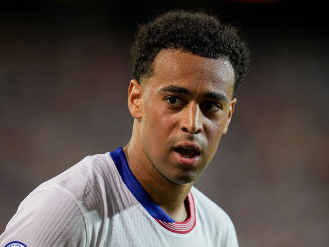 KANSAS CITY, MO - JULY 1: Tyler Adams #4 of USA looking for the ball during a Copa America 2024 Group C match between Uruguay and United States at Arrowhead Stadium on July 1, 2024 in Kansas City, Missouri.