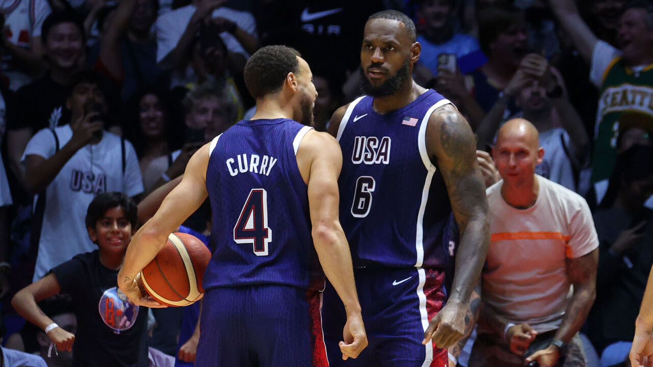 LONDON, ENGLAND - JULY 20: Stephen Curry #4 and LeBron James #6 of Team USA celebrate during the game against South Sudan as part of the 2024 USA Basketball Showcase on July 20, 2024 in London, England at O2 Arena. NOTE TO USER: User expressly acknowledges and agrees that, by downloading and/or using this photograph, user is consenting to the terms and conditions of the Getty Images License Agreement. Mandatory Copyright Notice: Copyright 2024 NBAE