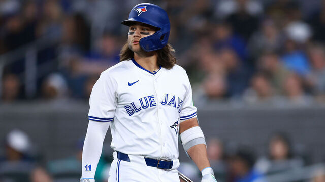 TORONTO, ON - MAY 10: Bo Bichette #11 of the Toronto Blue Jays returns to the dugout after striking out during a game against the Minnesota Twins at Rogers Centre on May 10, 2024 in Toronto, Ontario, Canada.