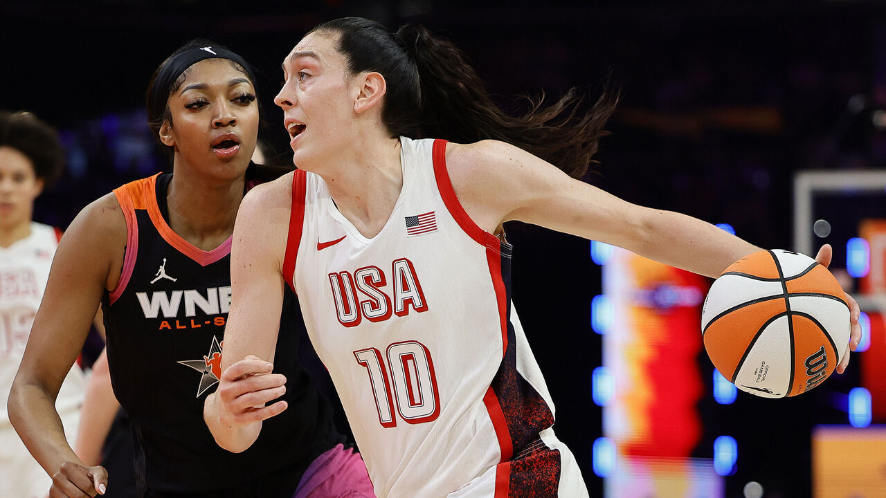 PHOENIX, ARIZONA - JULY 20: Breanna Stewart #10 of Team USA drives to the rim over Angel Reese #5 of Team WNBA in the fourth quarter during the 2024 WNBA All Star Game at Footprint Center on July 20, 2024 in Phoenix, Arizona.