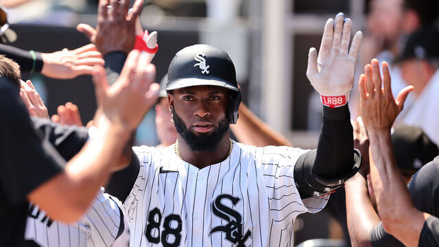 CHICAGO, ILLINOIS - JULY 10: Luis Robert Jr. #88 of the Chicago White Sox high fives teammates after hitting a two-run home run off Bailey Ober #17 of the Minnesota Twins (not pictured) during the sixth inning at Guaranteed Rate Field on July 10, 2024 in Chicago, Illinois.