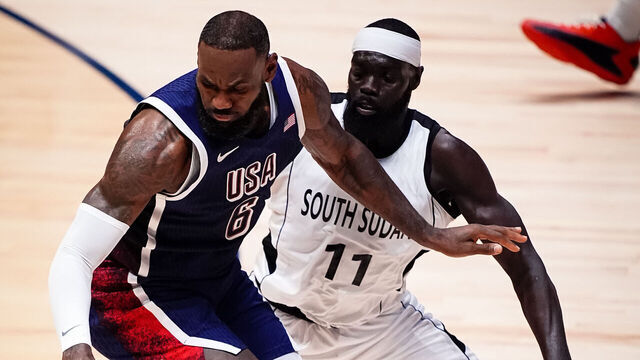 USA's LeBron James and South Sudan's Marial Shayok during the 2024 USA Basketball Showcase at the O2 Arena, London. Picture date: Saturday July 20, 2024.