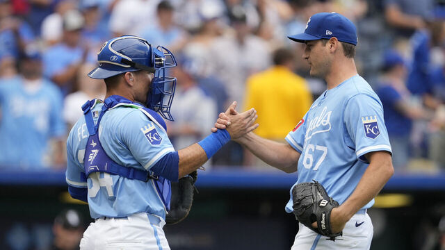 KANSAS CITY, MISSOURI - JULY 21: Freddy Fermin #34 of the Kansas City Royals and Seth Lugo #67 of the Kansas City Royals celebrate a 4-1 win over the Chicago White Sox at Kauffman Stadium on July 21, 2024 in Kansas City, Missouri.