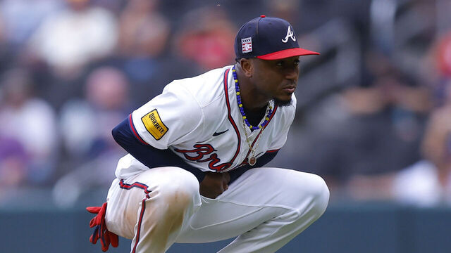 ATLANTA, GEORGIA - JULY 21: Ozzie Albies #1 of the Atlanta Braves reacts after an injury during the ninth inning against the St. Louis Cardinals at Truist Park on July 21, 2024 in Atlanta, Georgia.