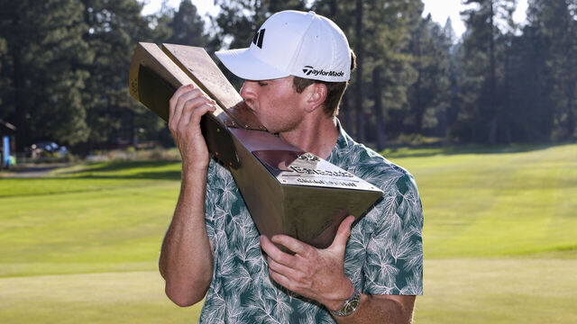 TRUCKEE, CALIFORNIA - JULY 21: Nick Dunlap poses with the trophy after winning the Barracuda Championship at the Old Greenwood course at Tahoe Mountain Club on July 21, 2024 in Truckee, California.