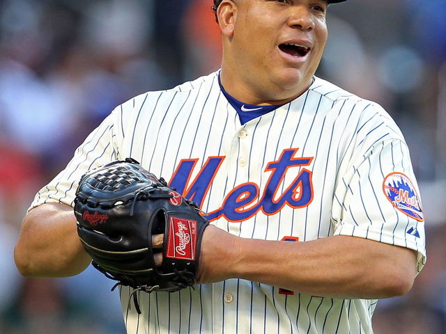 GIF: Bartolo Colon shows bunt, swings, nearly loses helmet