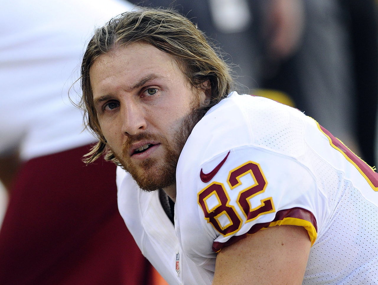 Washington Redskins' Logan Paulsen (82) is tackled by Philadelphia