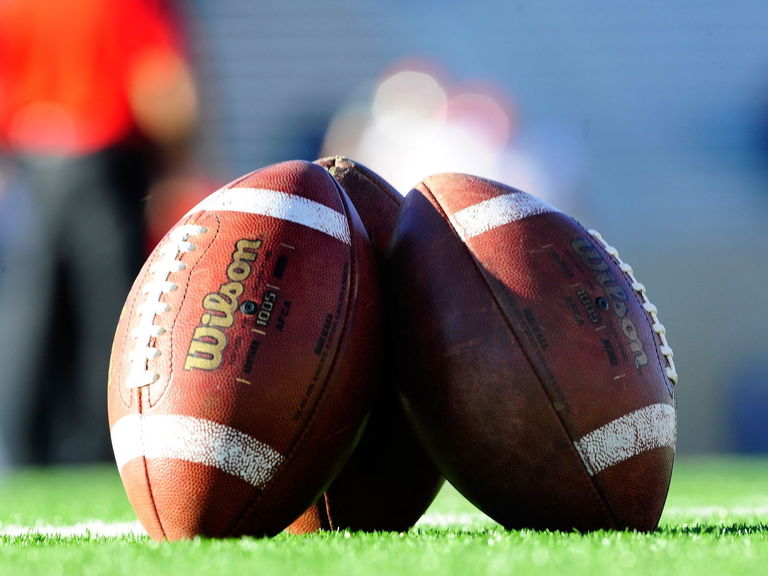 VIDEO High school player pulls off opponent's helmet, bashes him with