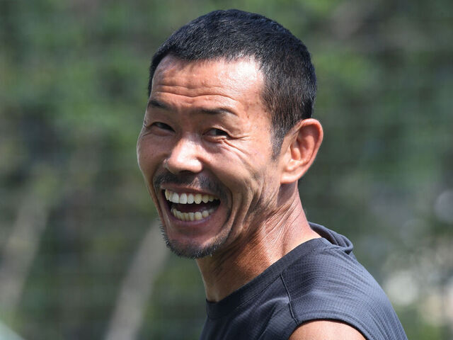 This picture taken on July 28, 2018 shows Son Woong-jung, father of South Korean football star Son Heung-min, smiling at his football academy in Chuncheon, 75 kilometres east of Seoul. - As Son Heung-min's career takes off in England, his legacy is already taking shape in South Korea -- at an innovative academy where ball control is king and shooting is frowned upon. The SON Football Academy in Son's native Chuncheon, run by his father Son Woong-jung, takes an unusual approach for Korean sports, where training is typically strenuous and young players practise for up to eight hours a day.