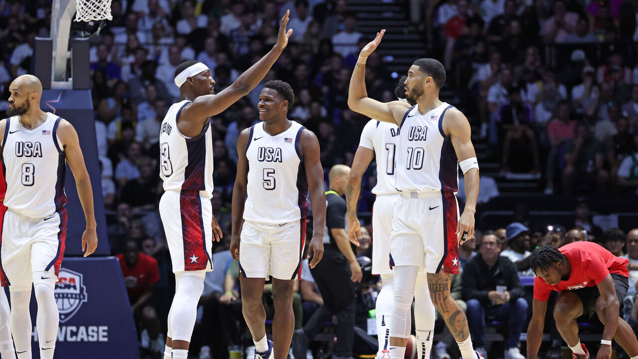 LONDON, ENGLAND - JULY 22: Bam Adebayo #13 high fives Jayson Tatum #10 of Team USA during the game against Team Germany as part of the 2024 USA Basketball Showcase on July 22, 2024 in London, England at O2 Arena. NOTE TO USER: User expressly acknowledges and agrees that, by downloading and/or using this photograph, user is consenting to the terms and conditions of the Getty Images License Agreement. Mandatory Copyright Notice: Copyright 2024 NBAE