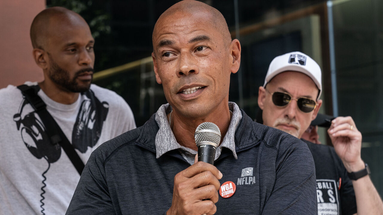 NEW YORK, UNITED STATES - 2023/07/26: Executive Director NFL (National Football League) players Association Lloyd Howell speaks as striking members of Writers Guild of America picketing in front of CBS Broadcast Center on theme Sport Writers Picket. Executives from NHL Players Association, NFL Players Association, MLB Players Association joined and spoke during picket.