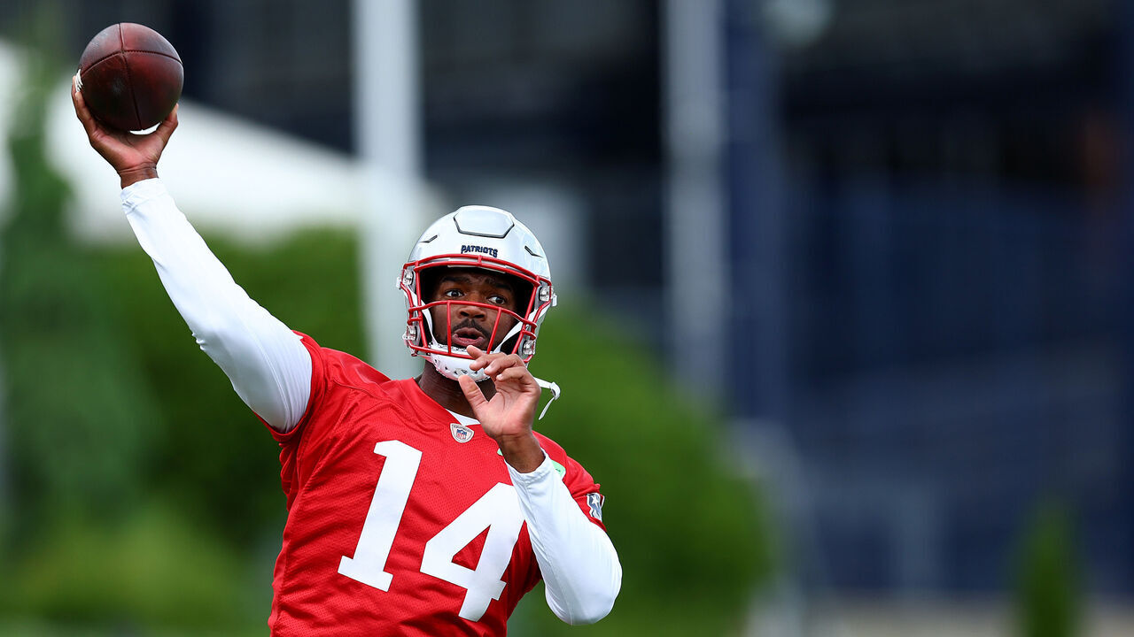 FOXBOROUGH, MASSACHUSETTS - MAY 29: Jacoby Brissett #14 of the New England Patriots makes a pass during the New England Patriots OTA Offseason Workout on May 29, 2024 in Foxborough, Massachusetts.