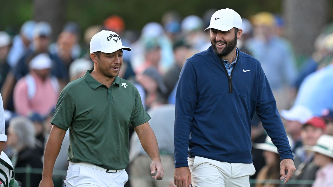 AUGUSTA, GEORGIA - APRIL 12: Scottie Scheffler and Xander Schauffele laugh together while walking off the 17th tee box during the second round of Masters Tournament at Augusta National Golf Club on April 12, 2024 in Augusta, Georgia.