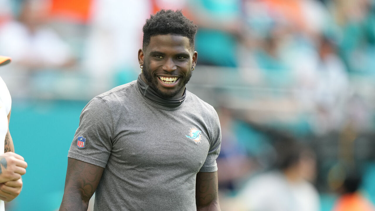 MIAMI GARDENS, FL - DECEMBER 17: Miami Dolphins wide receiver Tyreek Hill (10) laughs with teammates before the game between the New York Jets and the Miami Dolphins on Sunday, December 17, 2023 at Hard Rock Stadium, Hard Rock Stadium, Fla.