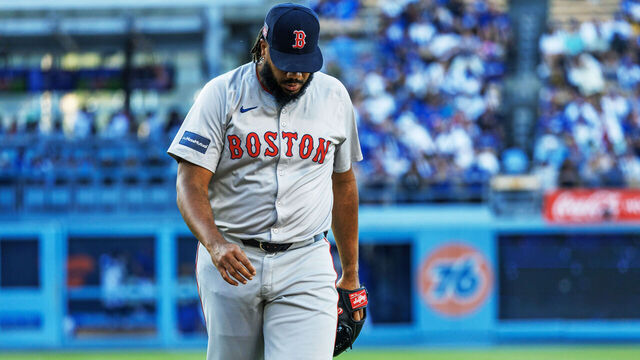 LOS ANGELES, CA - JULY 21, 2024: Former Dodgers closer Boston Red Sox pitcher Kenley Jansen (74) walks back to the dugout after giving up three runs to the Dodgers in the eighth inning on July 21, 2024 in Los Angeles, CA.(Gina Ferazzi / Los Angeles Times via Getty Images)