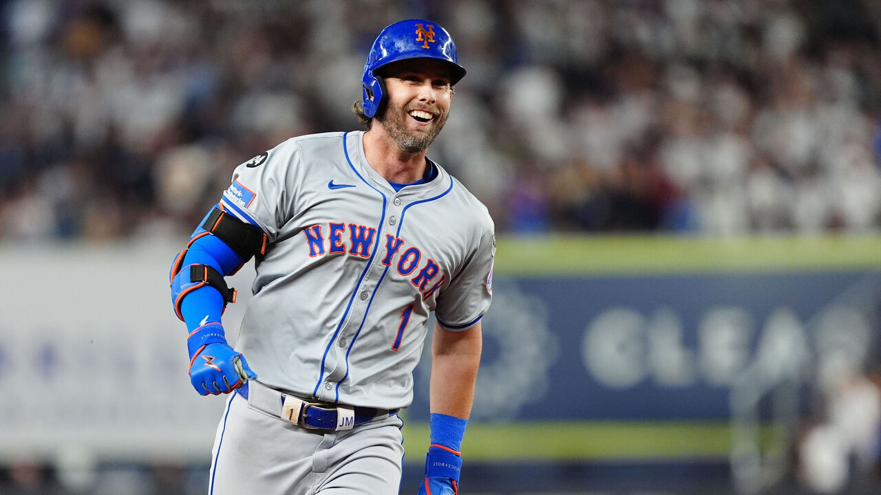 BRONX, NY - JULY 23: New York Mets Second Baseman Jeff McNeil (1) reacts to hitting a two run home run as he rounds the bases during the sixth inning of the Major League Baseball game between the New York Mets and New York Yankees on July 23, 2024, at Yankee Stadium in the Bronx, NY.