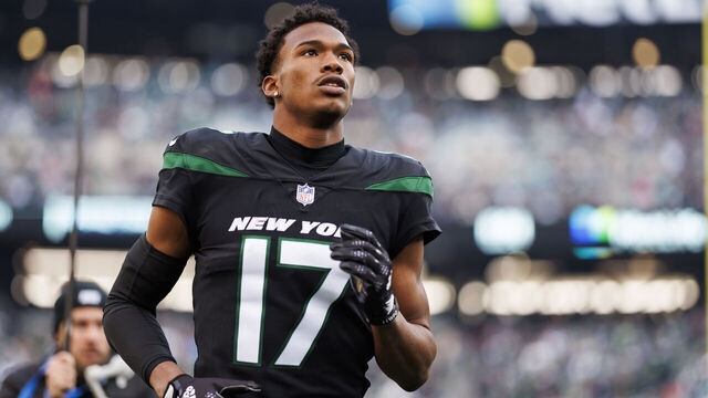 EAST RUTHERFORD, NEW JERSEY - NOVEMBER 24: Garrett Wilson #17 of the New York Jets runs onto the field during player introductions before an NFL football game against the Miami Dolphins at MetLife Stadium on November 24, 2023 in East Rutherford, New Jersey.