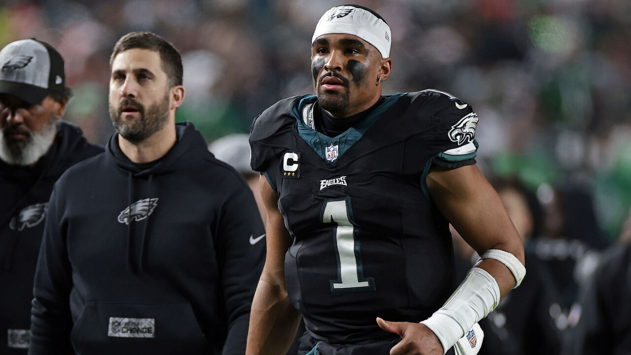PHILADELPHIA, PENNSYLVANIA - DECEMBER 25: Philadelphia Eagles head coach Nick Sirianni and Jalen Hurts #1 of the Philadelphia Eagles run off the field against the New York Giants at Lincoln Financial Field on December 25, 2023 in Philadelphia, Pennsylvania.