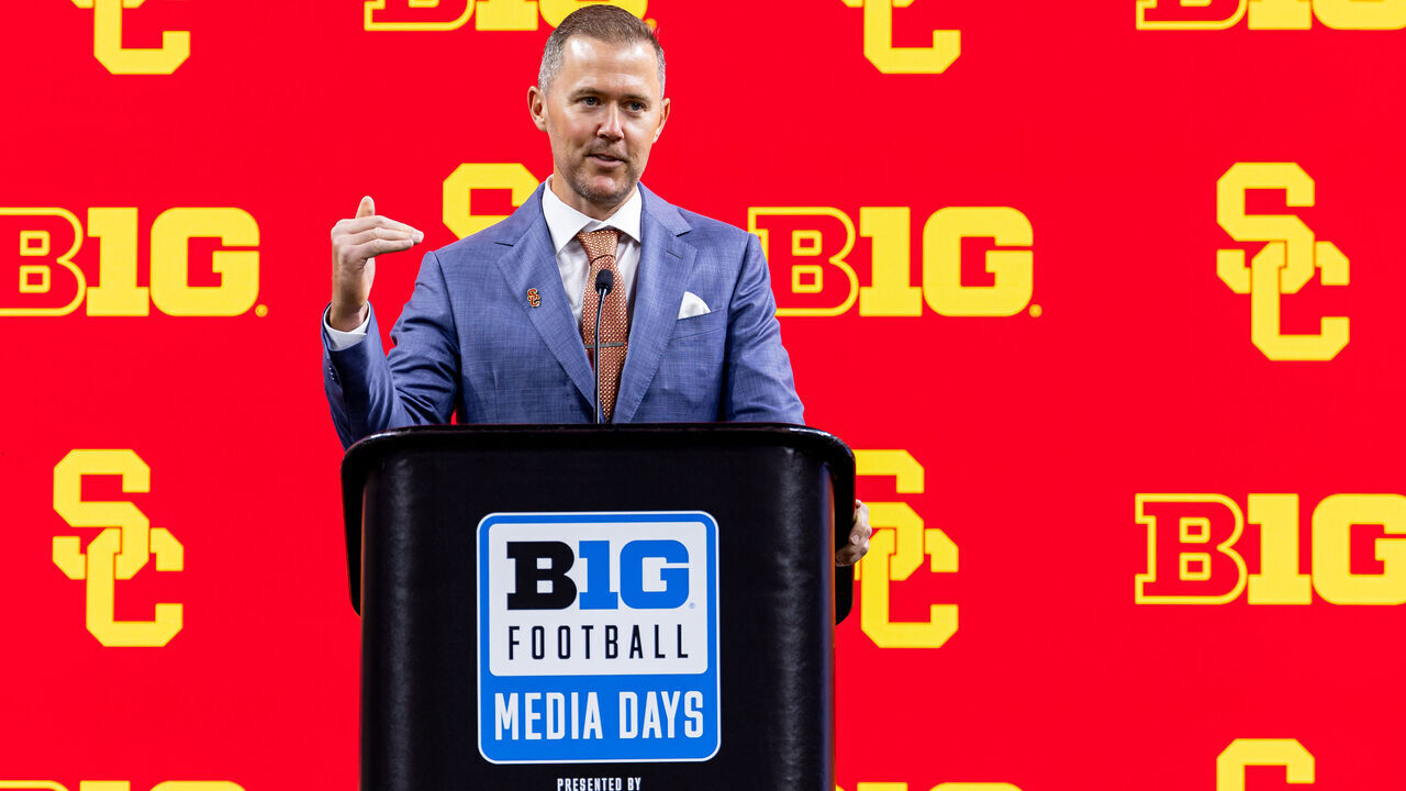 INDIANAPOLIS, INDIANA - JULY 24: Head coach Lincoln Riley of the USC Trojans speaks to the media during Big Ten football media days at Lucas Oil Stadium on July 24, 2024 in Indianapolis, Indiana.