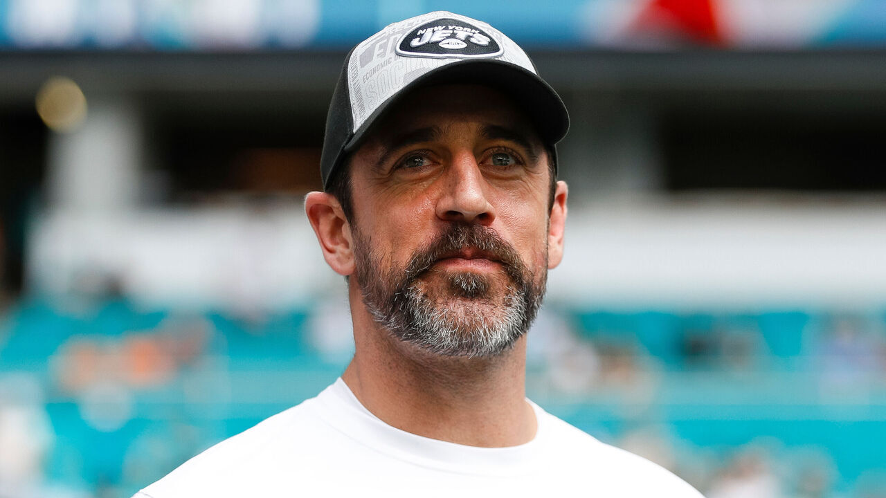 MIAMI GARDENS, FLORIDA - DECEMBER 17: Aaron Rodgers of the New York Jets smiles prior to a game against the Miami Dolphins at Hard Rock Stadium on December 17, 2023 in Miami Gardens, Florida.