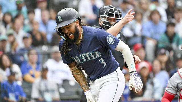 SEATTLE, WASHINGTON - JULY 22: J.P. Crawford #3 of the Seattle Mariners reacts to being hit by a pitch during the first inning against the Los Angeles Angels at T-Mobile Park on July 22, 2024 in Seattle, Washington.