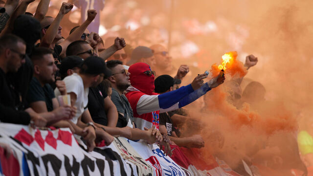 HAMBURG, GERMANY - JUNE 19: Fans of Croatia use an orange smoke flare during the UEFA EURO 2024 group stage match between Croatia and Albania at Volksparkstadion on June 19, 2024 in Hamburg, Germany.