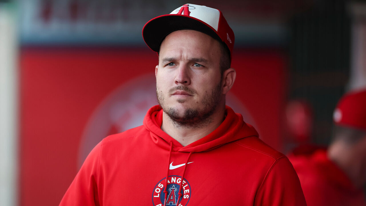 ANAHEIM, CALIFORNIA - JUNE 5: Mike Trout #27 of the Los Angeles Angels looks on in the dugout prior to a game against the San Diego Padres at Angel Stadium of Anaheim on June 5, 2024 in Anaheim, California.