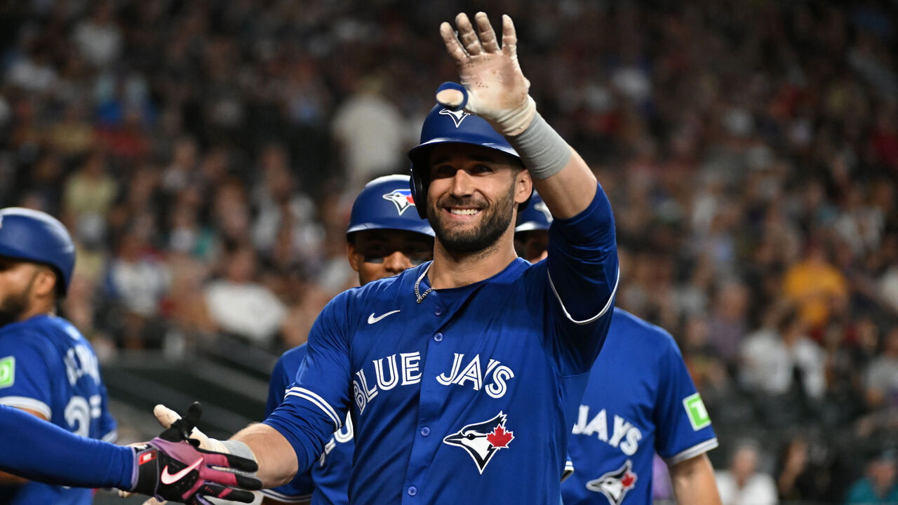PHOENIX, ARIZONA - JULY 14: Kevin Kiermaier #39 of the Toronto Blue Jays gestures to the crowd after hitting a grand slam home run against the Arizona Diamondbacks during the fourth inning at Chase Field on July 14, 2024 in Phoenix, Arizona.