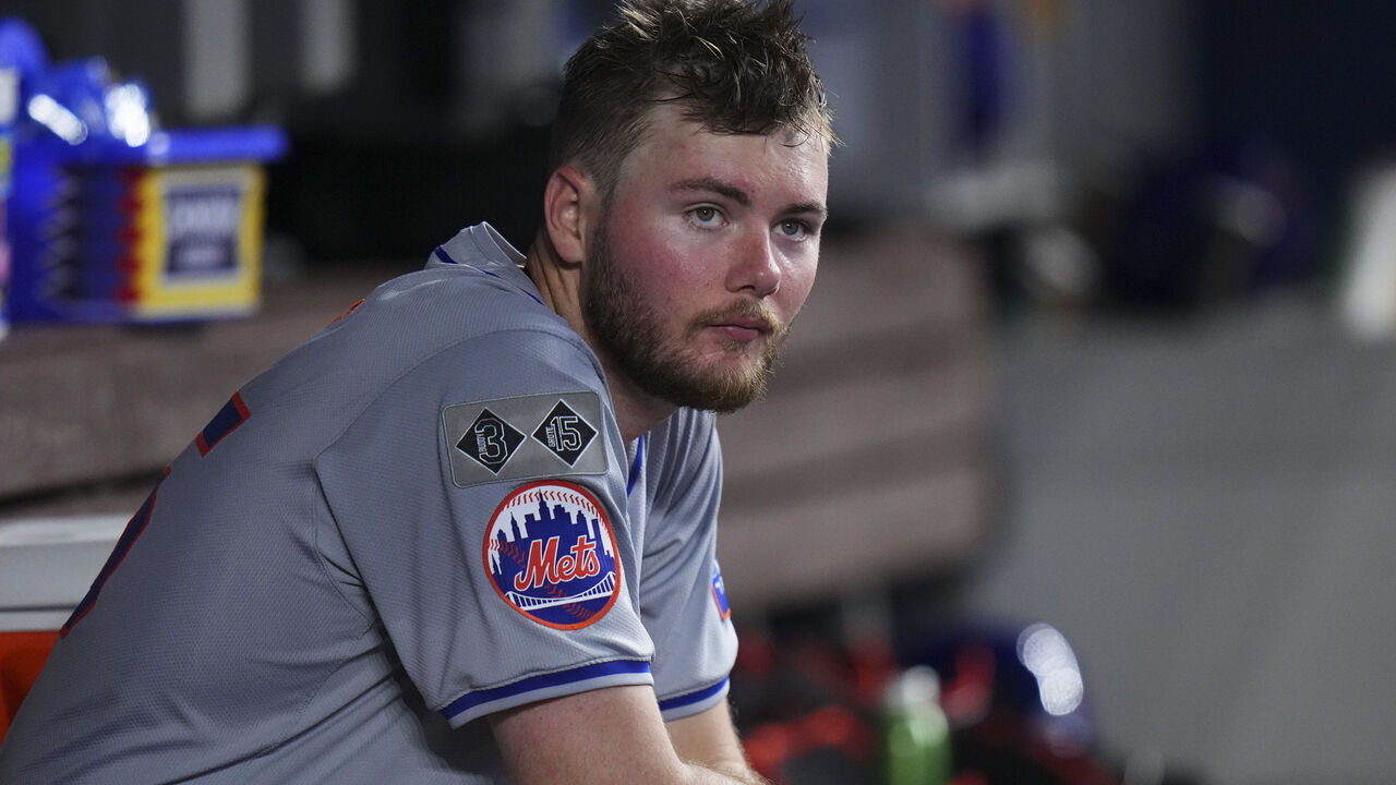 MIAMI, FLORIDA - JULY 21: Christian Scott #45 of the New York Mets looks on during a game against the Miami Marlins at loanDepot park on July 21, 2024 in Miami, Florida.