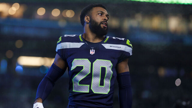 SEATTLE, WASHINGTON - DECEMBER 18: Julian Love #20 of the Seattle Seahawks runs onto the field during player introductions before an NFL football game against the Philadelphia Eagles at Lumen Field on December 18, 2023 in Seattle, Washington.