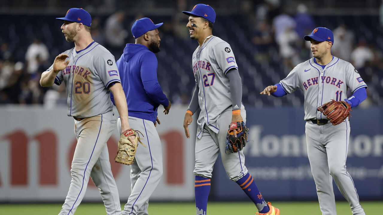 NEW YORK, NEW YORK - JULY 24: Pete Alonso #20, Starling Marte #6, Mark Vientos #27 and Jose Iglesias #11 of the New York Mets celebrate after defeating the New York Yankees at Yankee Stadium on July 24, 2024 in New York City.