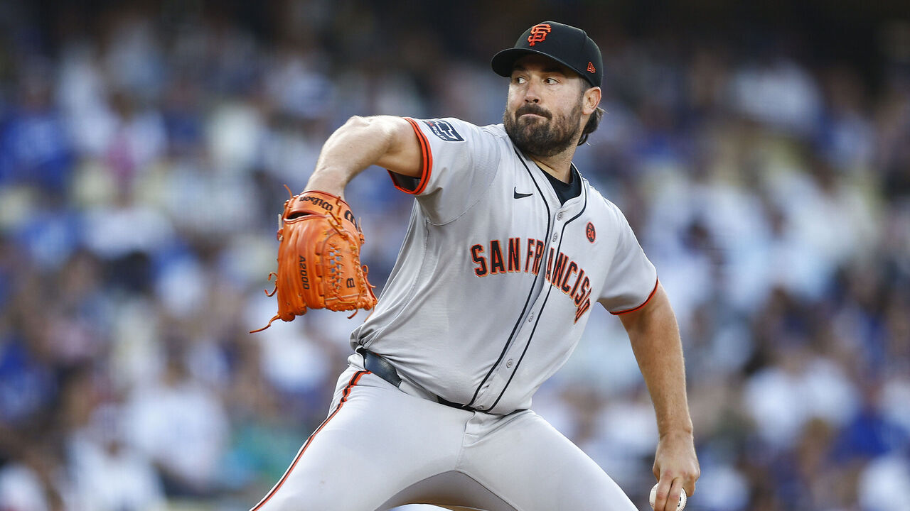 LOS ANGELES, CALIFORNIA - JULY 24: Robbie Ray #23 of the San Francisco Giants throws against the Los Angeles Dodgers in the first inning at Dodger Stadium on July 24, 2024 in Los Angeles, California.