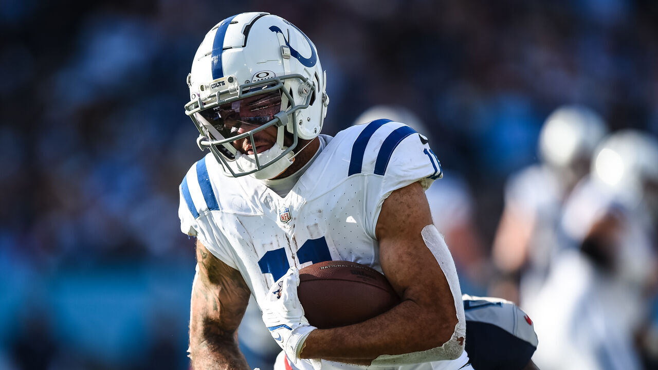 NASHVILLE, TN - DECEMBER 03: Indianapolis Colts wide receiver Michael Pittman Jr. (11) runs with the ball during the NFL game between the Tennessee Titans and the Indianapolis Colts on December 3, 2023, at Nissan Stadium in Nashville, TN.