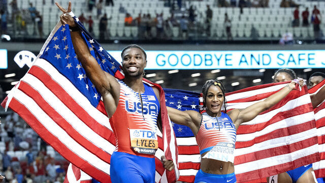 BUDAPEST, HUNGARY: August 26: Noah Lyles of the United States and Sha'Carri Richardson of the United States celebrates the team's gold medal wins with teammates after the Women's and Men's 4x100m Relay Finals during the World Athletics Championships, at the National Athletics Centre on August 26th, 2023 in Budapest, Hungary.