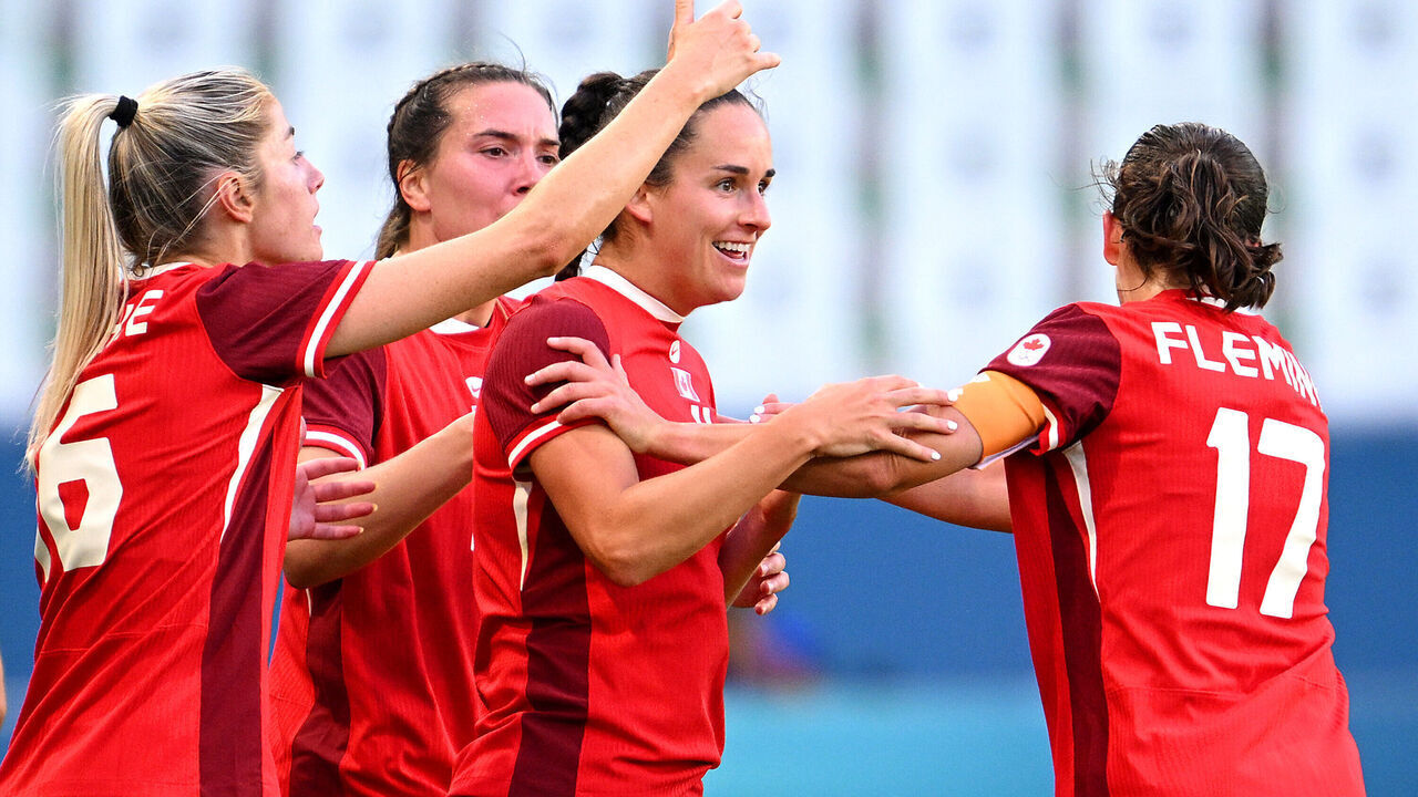 SAINT-ETIENNE, FRANCE - JULY 25: Evelyne Viens #4 of Team Canada celebrates scoring her team's second goal with teammates during the Women's group A match between Canada and New Zealand during the Olympic Games Paris 2024 at Stade Geoffroy-Guichard on July 25, 2024 in Saint-Etienne, France.