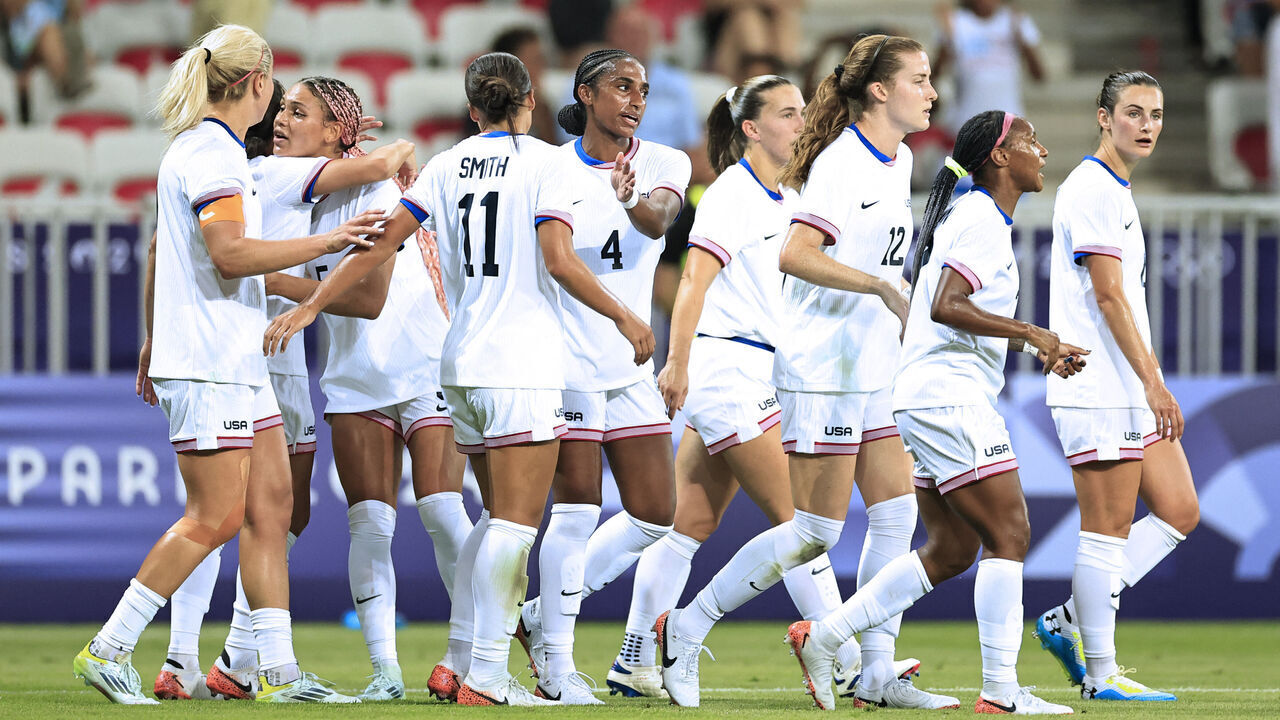 US' forward #05 Trinity Rodman (3L) celebrates scoring the opening goal in the women's group A football match between the USA and Zambia during the Paris 2024 Olympic Games at the Nice Stadium in Nice, on July 25, 2024.